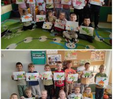 na zdjęciu widać salę przedszkolną, dzieci prezentują wykonane prace